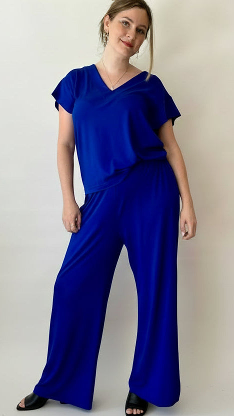 Woman wearing wide leg pant with matching colour yoke back tee