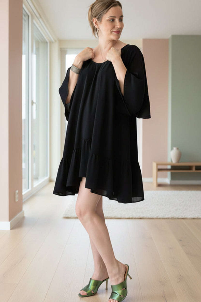V-neck little black dress wih frilled hem